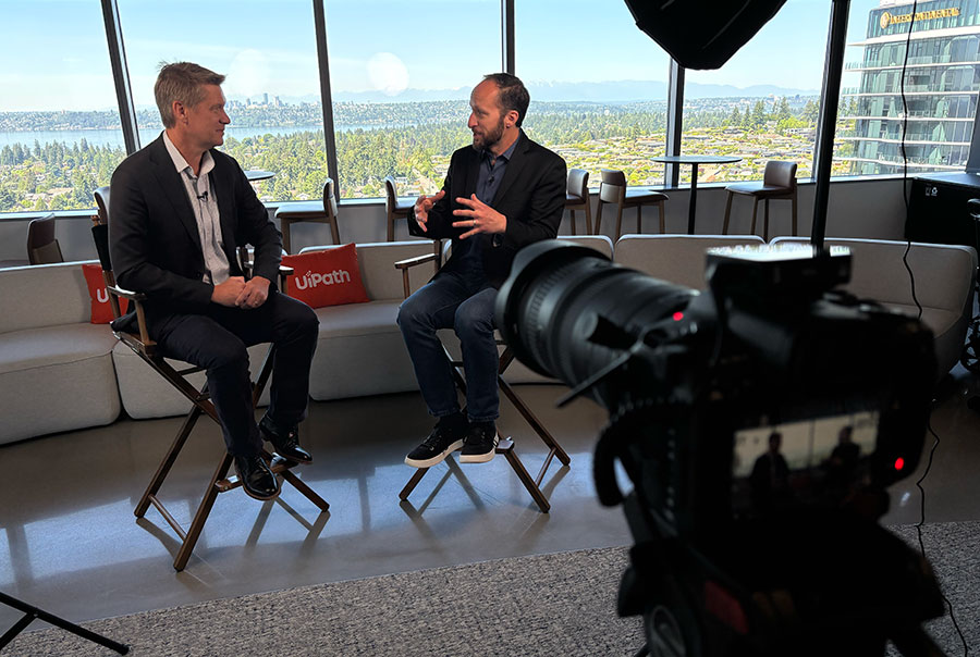 GeekWire cofounder John Cook and UiPath's Michael Atalla