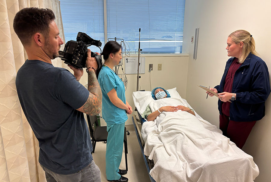 Videographer shooting video content in medical clinic